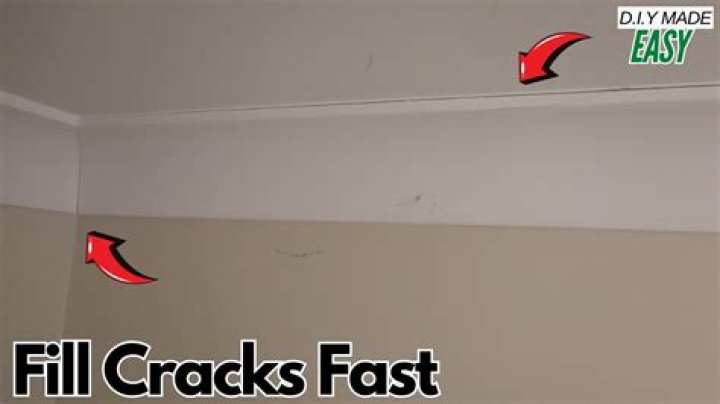 How do you fill cracks between floor and wall?