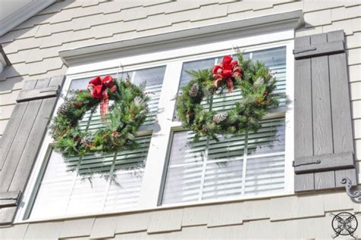 How do you hang wreaths on windows outside?